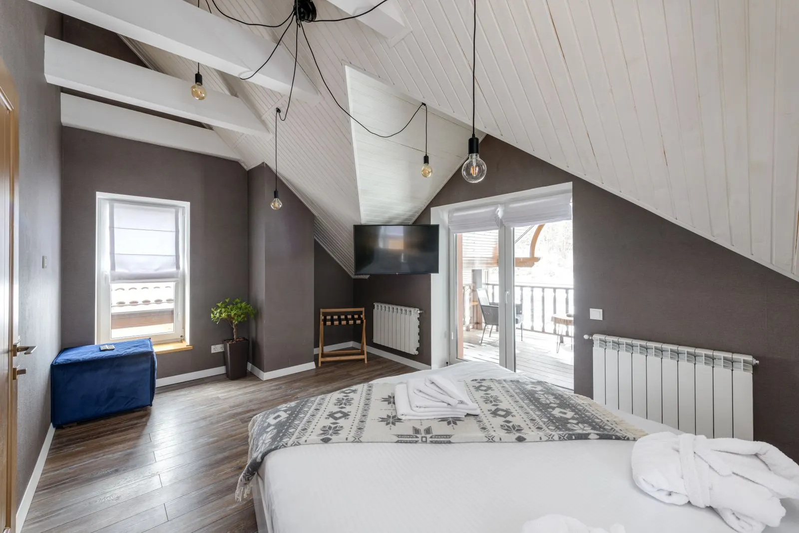 A second bedroom with balcony access, sample image