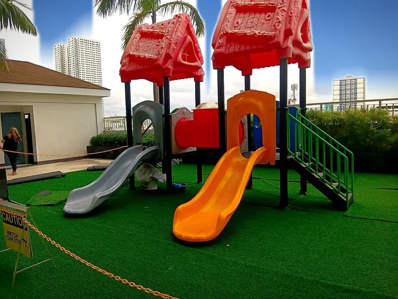 A red and yellow playground on the amenity deck