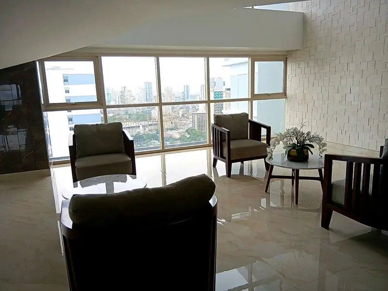 Armchairs by the windows of the sky lounge